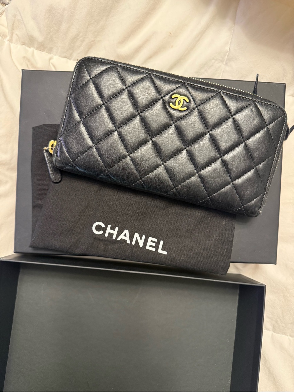 CHANEL Black Quilted Leather Zip Wallet with Gold CC